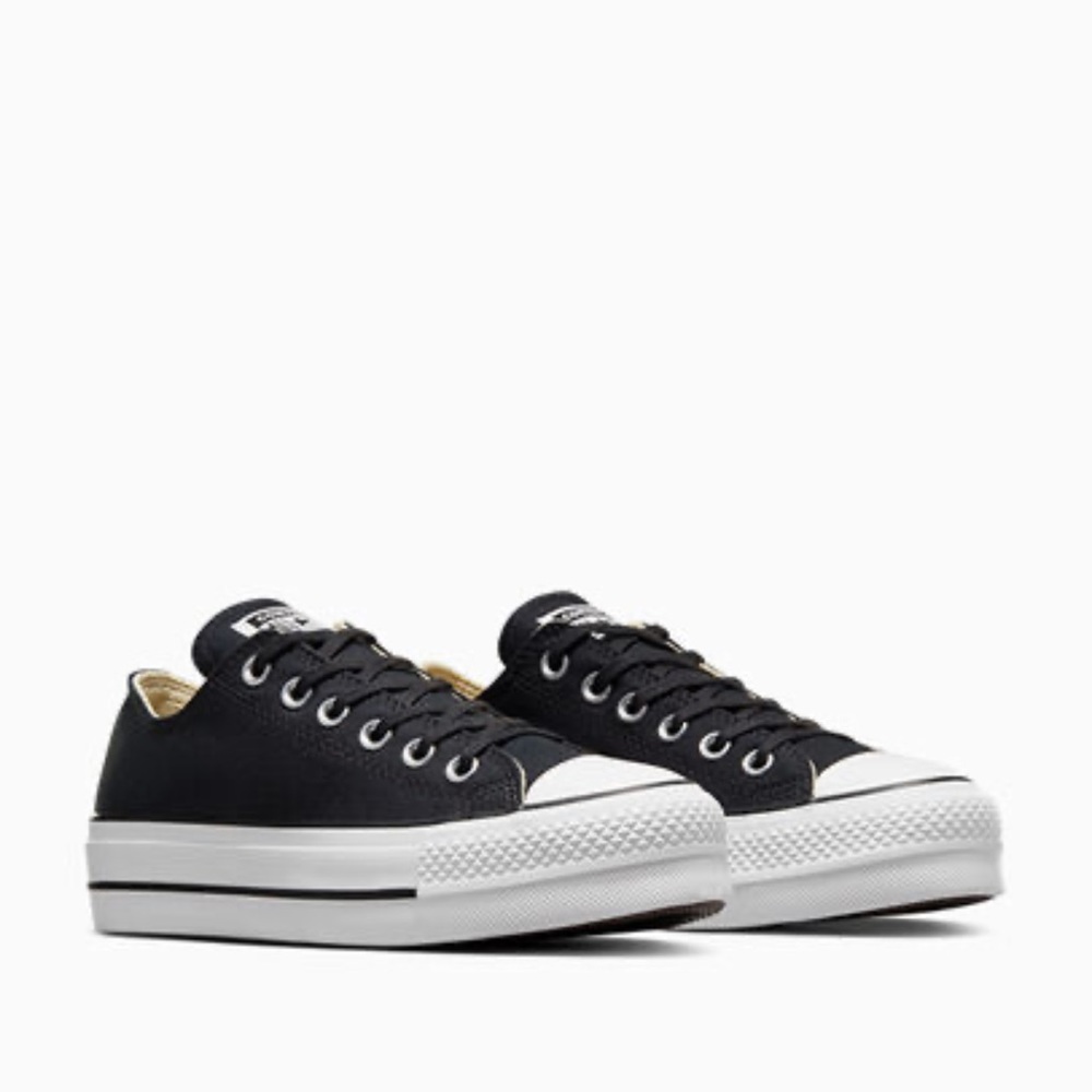 Women’s all star converse with platform in black size 8.